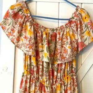 Fun and flowy off shoulder dress.